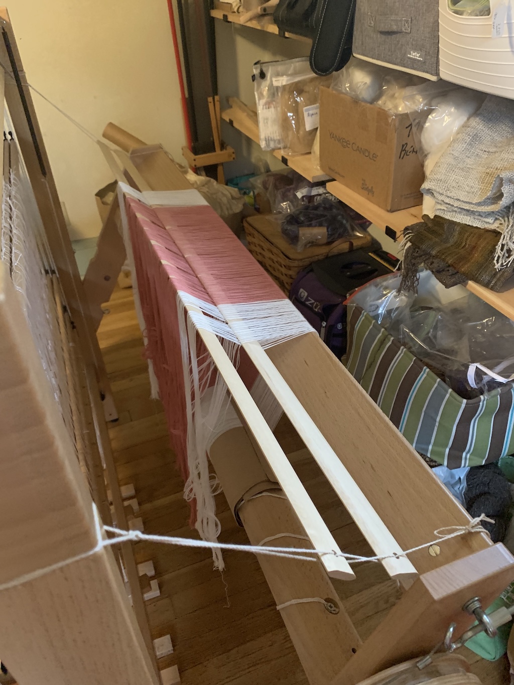 Warp is now beamed and lease sticks positioned for threading.